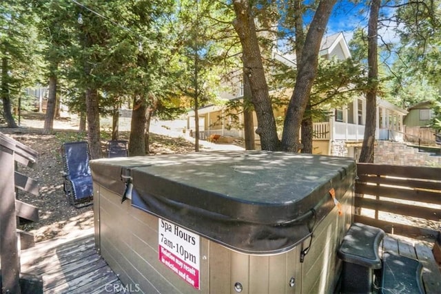 view of yard with a hot tub