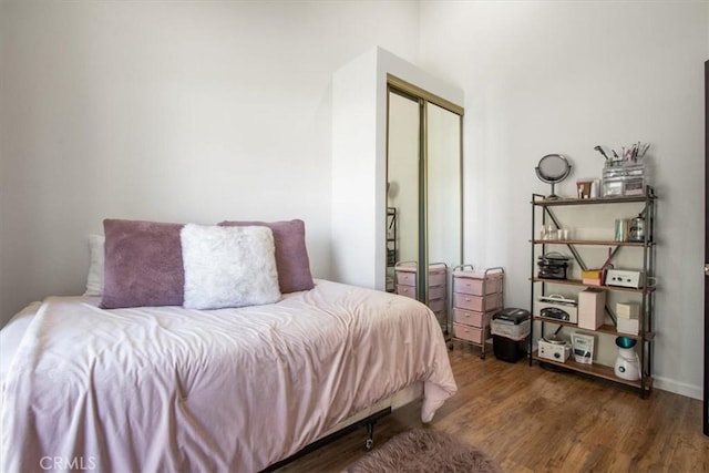 43334 32nd St W Unit 44, Lancaster, CA 93536 - bedroom with wood finished floors and a closet
