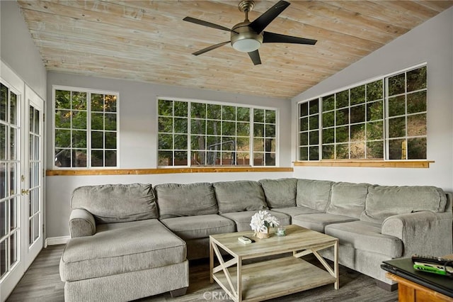 sunroom featuring ceiling fan, lofted ceiling, and wood ceiling