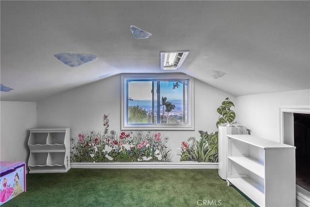 bonus room with vaulted ceiling and dark carpet