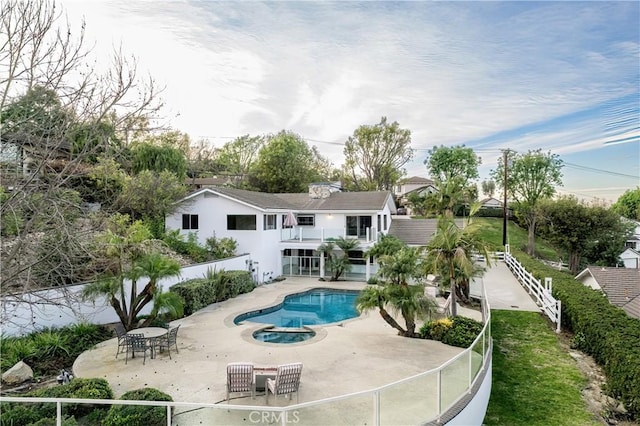 view of pool featuring a patio area