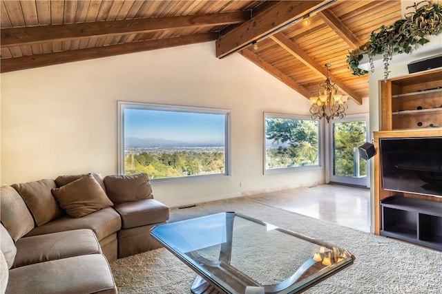 living room featuring lofted ceiling with beams, a notable chandelier, and wood ceiling