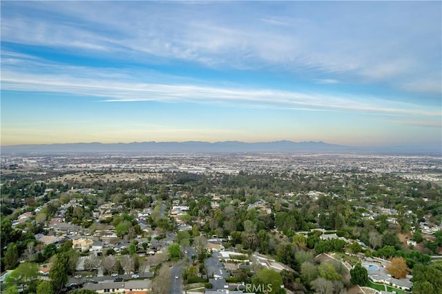 aerial view at dusk with a mountain view