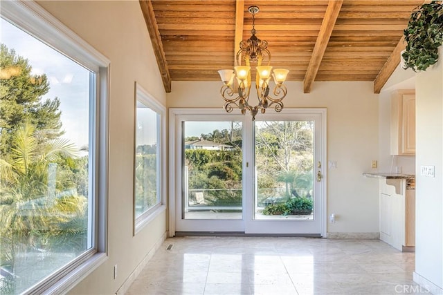 unfurnished sunroom featuring wooden ceiling, vaulted ceiling with beams, and a notable chandelier