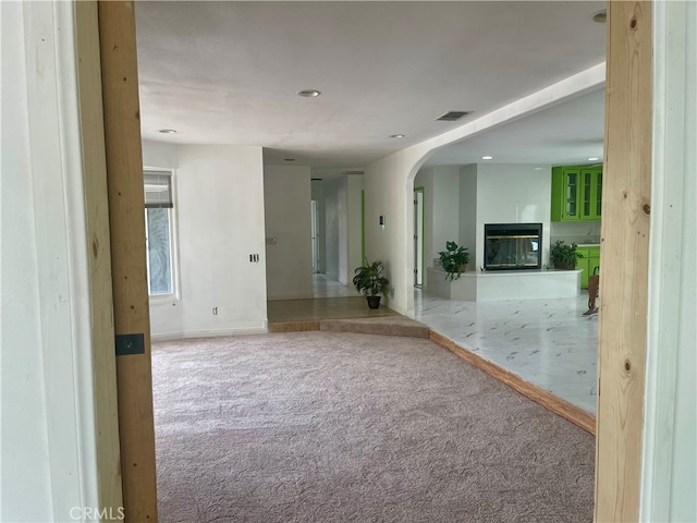 corridor featuring carpet flooring