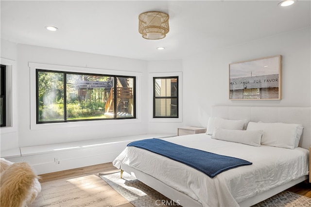 bedroom featuring wood-type flooring