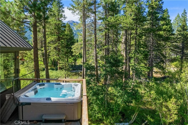 view of pool featuring a hot tub