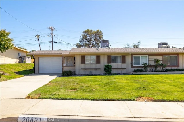 ranch-style house with a front lawn, central AC unit, and a garage