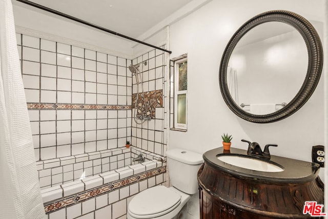 full bathroom with shower / bathtub combination with curtain, vanity, and toilet