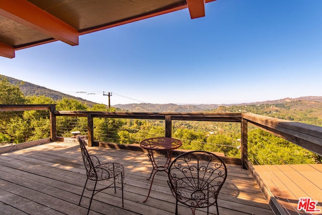 deck featuring a mountain view