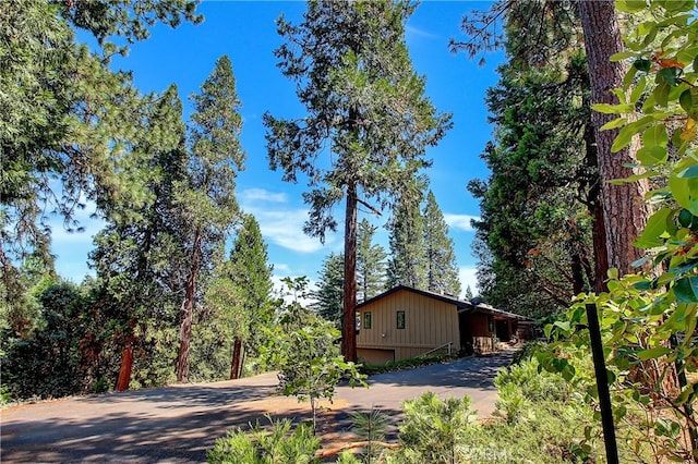 view of side of home featuring a garage