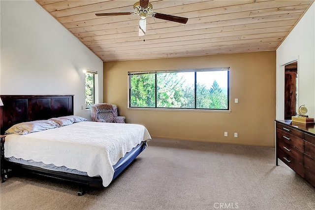 carpeted bedroom featuring wood ceiling, lofted ceiling, and ceiling fan