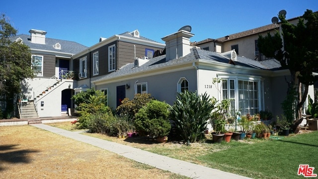 exterior space with a lawn