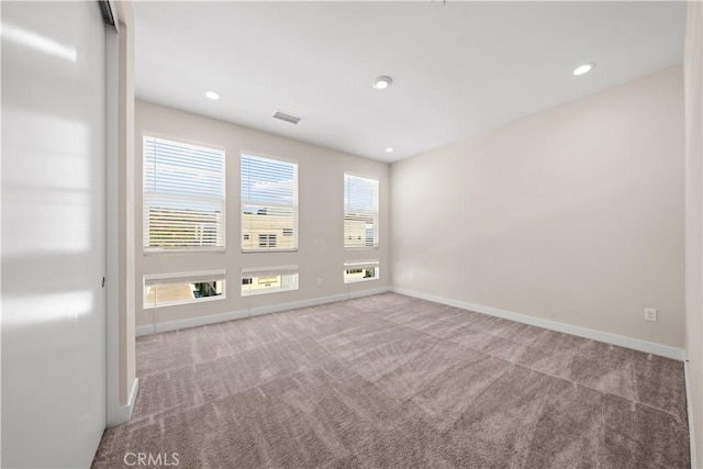 view of carpeted spare room