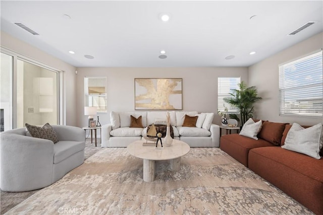 living room featuring light colored carpet