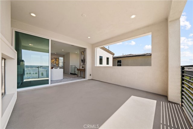 view of patio / terrace with a balcony