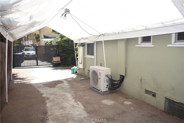 view of patio / terrace featuring ac unit