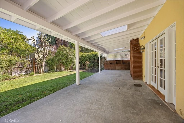 view of patio / terrace featuring french doors and a fenced backyard