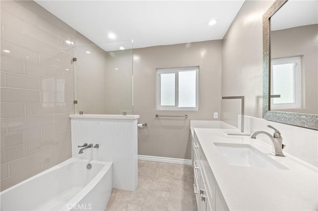 full bath with baseboards, vanity, and recessed lighting