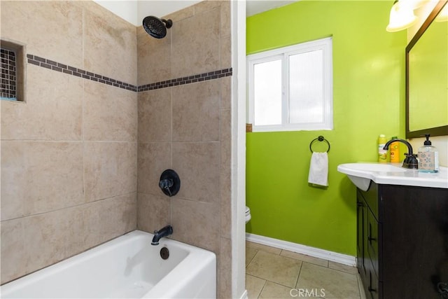 full bathroom with toilet, tiled shower / bath combo, tile patterned flooring, and vanity