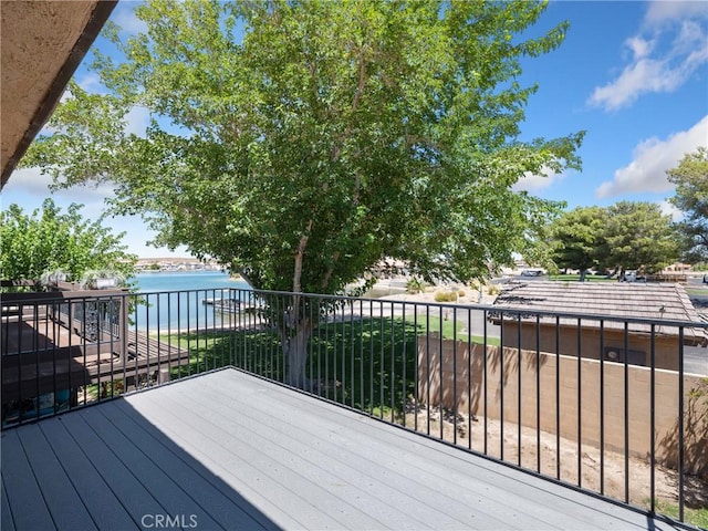 deck featuring a water view