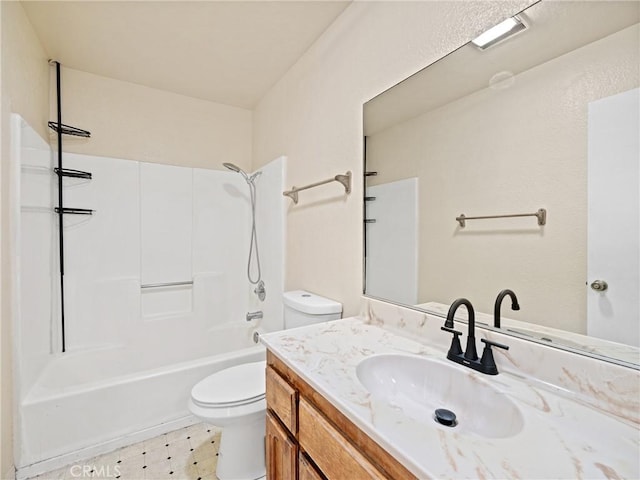 full bathroom with vanity,  shower combination, and toilet