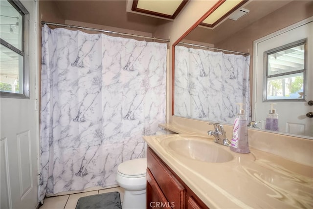 bathroom with tile walls, vanity, tile patterned flooring, a shower with shower curtain, and toilet