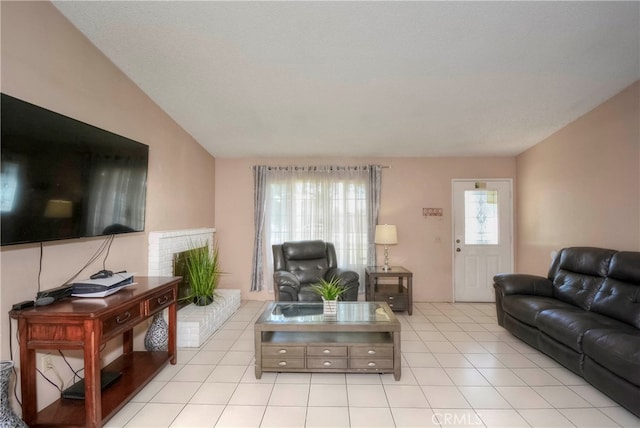 living room with light tile patterned flooring