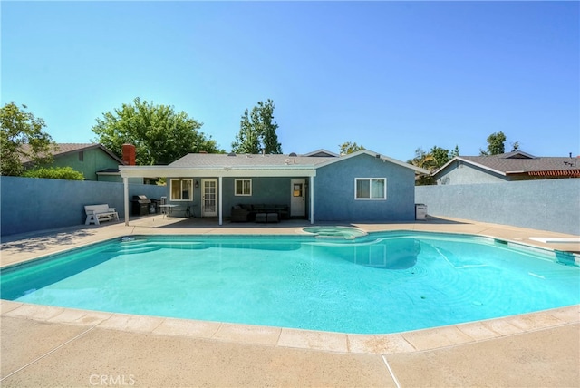 view of pool featuring a patio