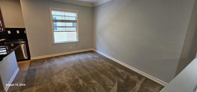 kitchen with carpet flooring, dishwasher, and ornamental molding