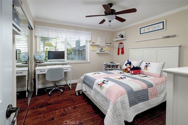 bedroom with ceiling fan, dark hardwood / wood-style flooring, and ornamental molding