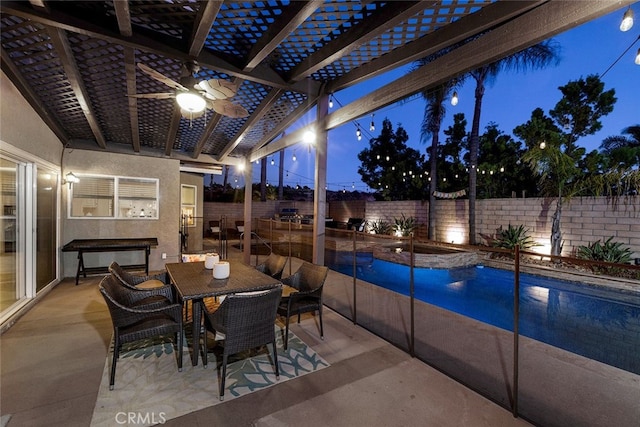 view of patio / terrace with a pergola, a fenced in pool, and ceiling fan