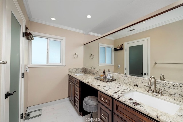 bathroom featuring vanity and ornamental molding