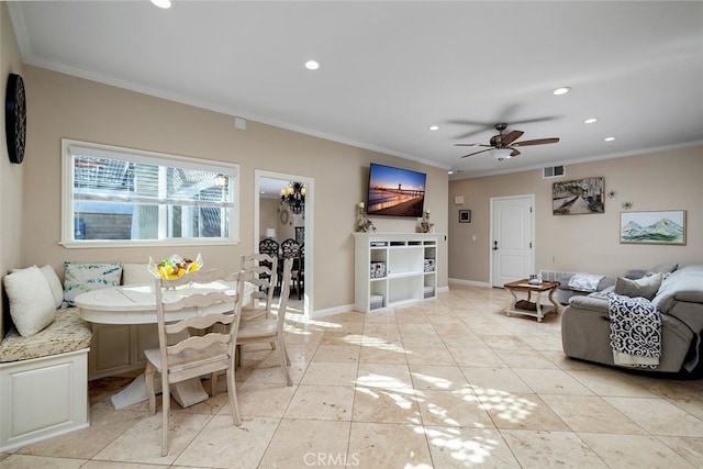 living room featuring ceiling fan, light tile patterned floors, and ornamental molding