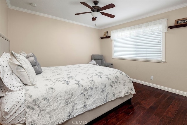 bedroom with ornamental molding, ceiling fan, and dark wood-type flooring