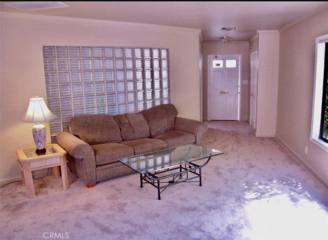 living room featuring light colored carpet and ornamental molding