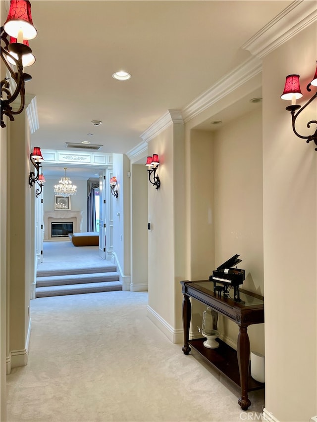 corridor featuring crown molding and carpet floors