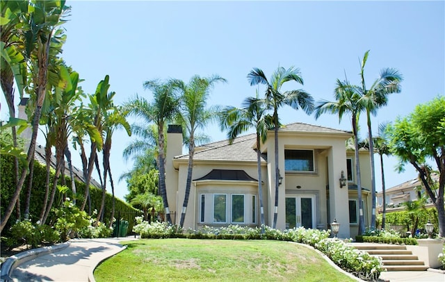 view of front of home with a front yard