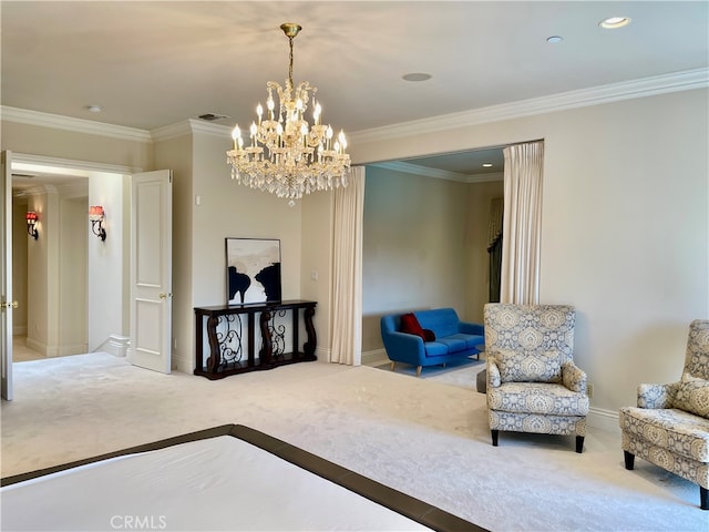 sitting room with crown molding, a chandelier, and carpet