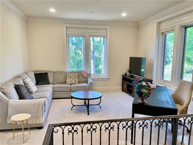 living room with a healthy amount of sunlight and ornamental molding