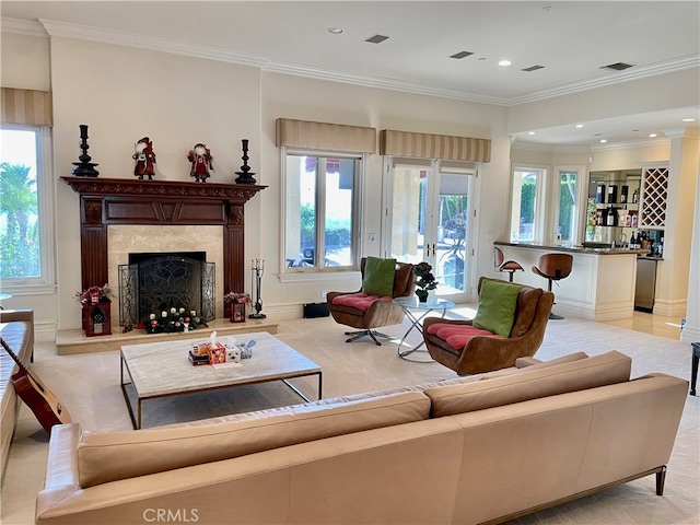 living room featuring light carpet and crown molding