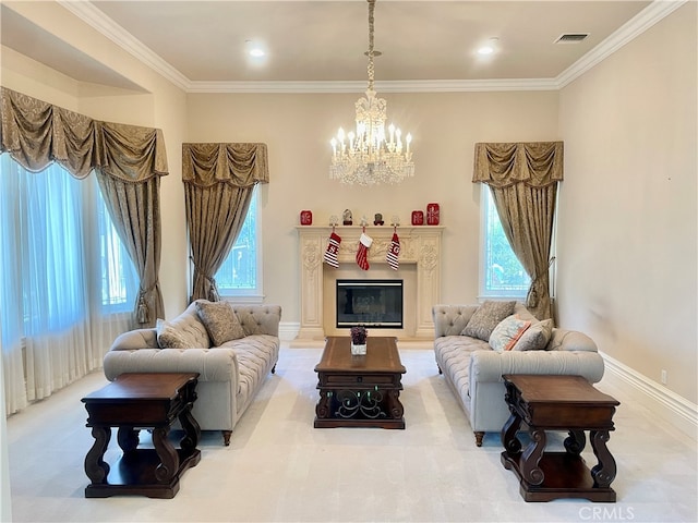 living room with a chandelier, crown molding, and a healthy amount of sunlight