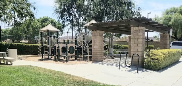 view of community featuring a pergola and a playground