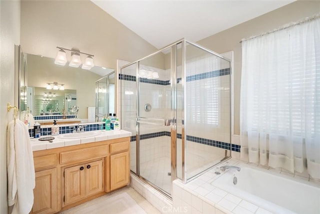 bathroom with plus walk in shower and vanity