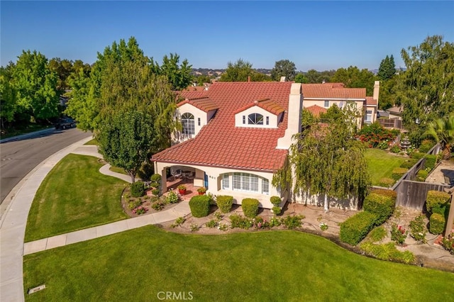 view of front of home featuring a front lawn