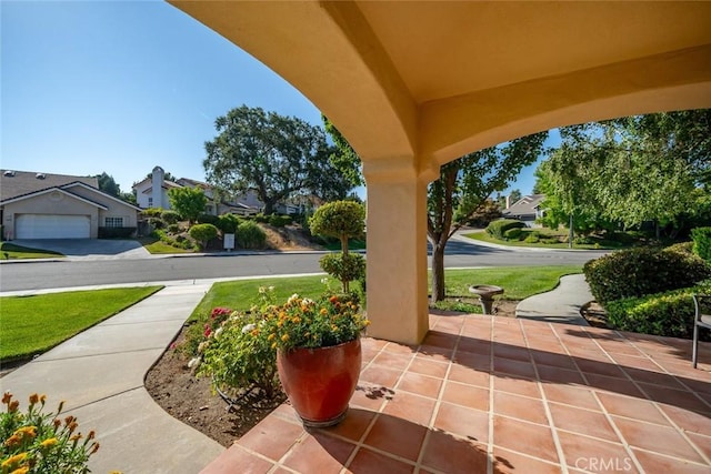 view of patio / terrace with a garage