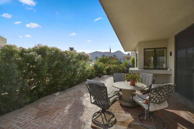 view of patio featuring a mountain view