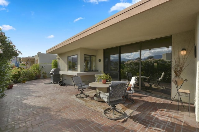 view of patio / terrace featuring a grill