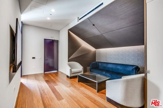 living area featuring hardwood / wood-style floors