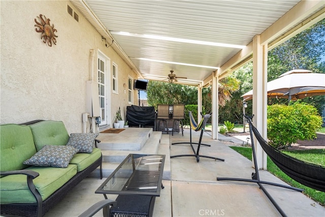 view of patio / terrace featuring outdoor lounge area and ceiling fan